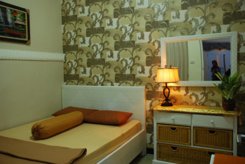 Griya Nelwan Guest House Маланг Номер фото